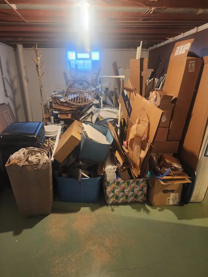 Roll-off dumpster container at job site for 2 Yard Dumpster Rental in Oatfield